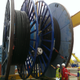 Large undersea cable reels.
